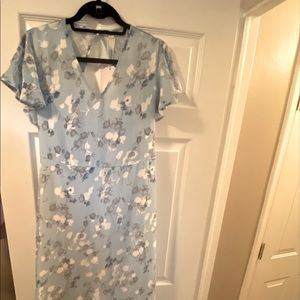Women’s floral short sleeve maxi dress with open back, size large.